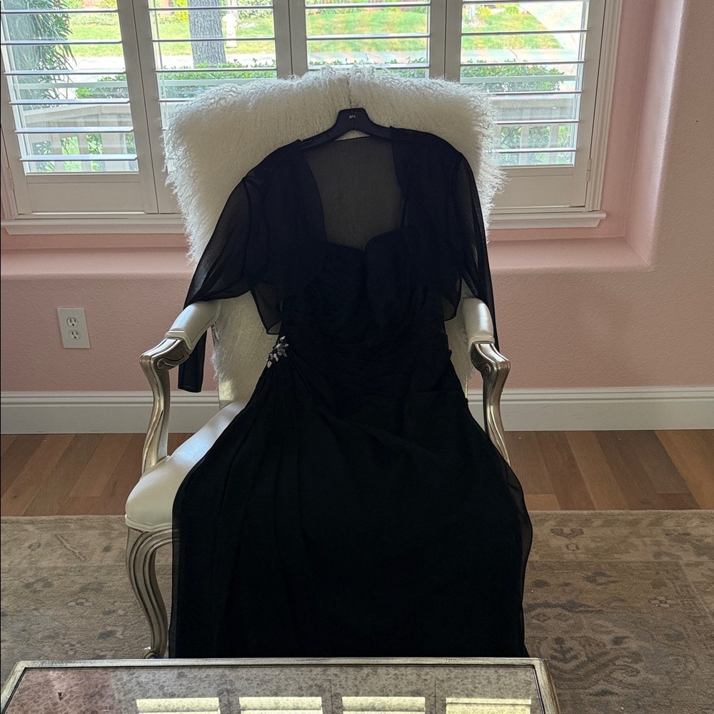 Val Stefani Black Long dress with cropped sheer jacket.